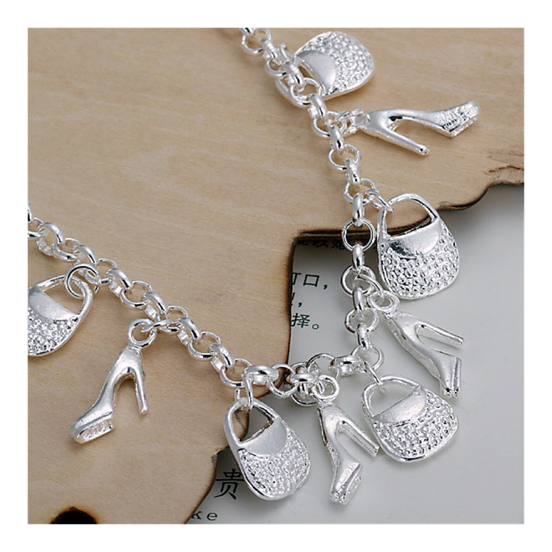 Vakre armbånd sko og taske av høy kvalitet