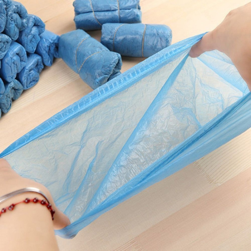 Waterproof disposable shoe cover in plastic shoe cover